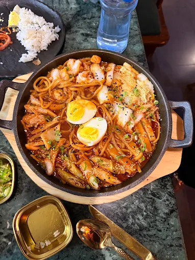 Warm Korean dishes spread on the table